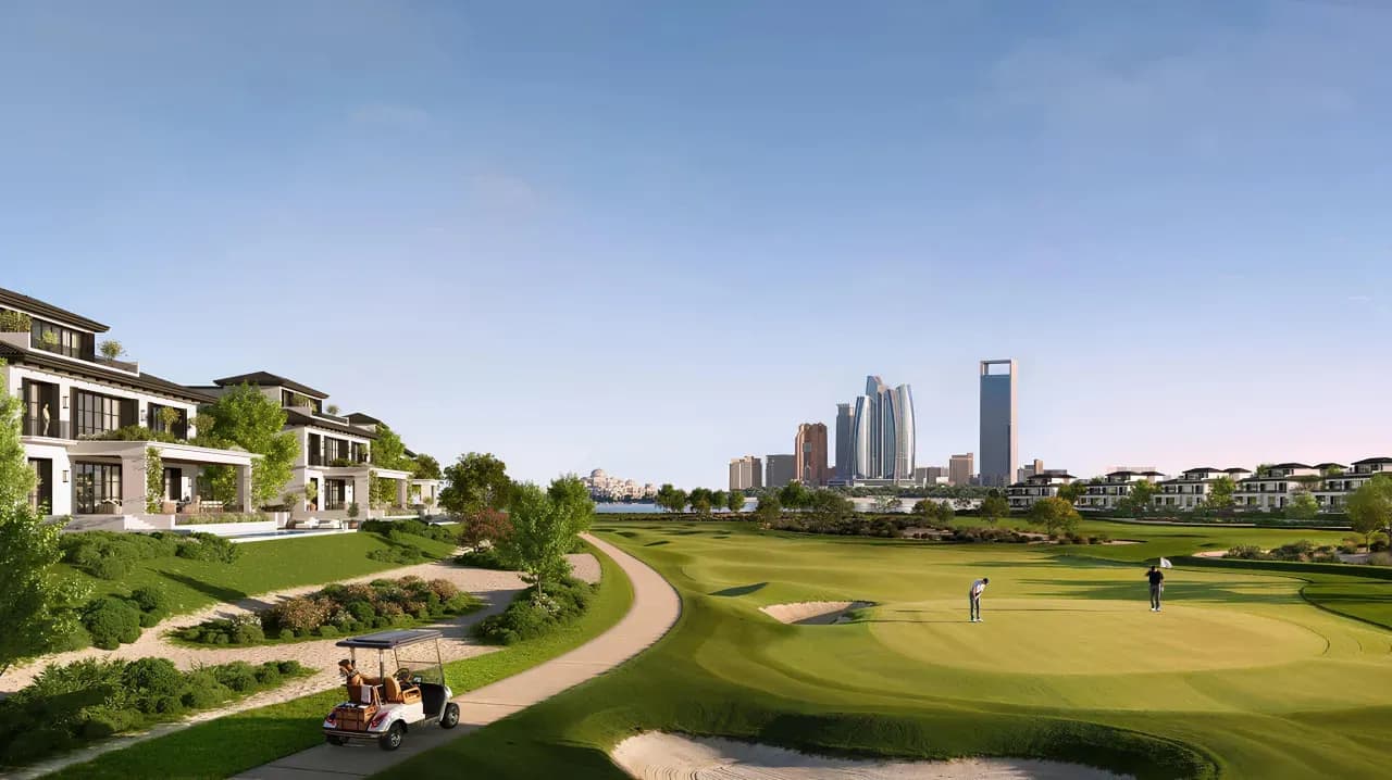 Championship fairway with the Abu Dhabi skyline beyond